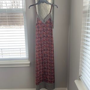 Multi colored putt on up maxi dress. Size small. Never worn